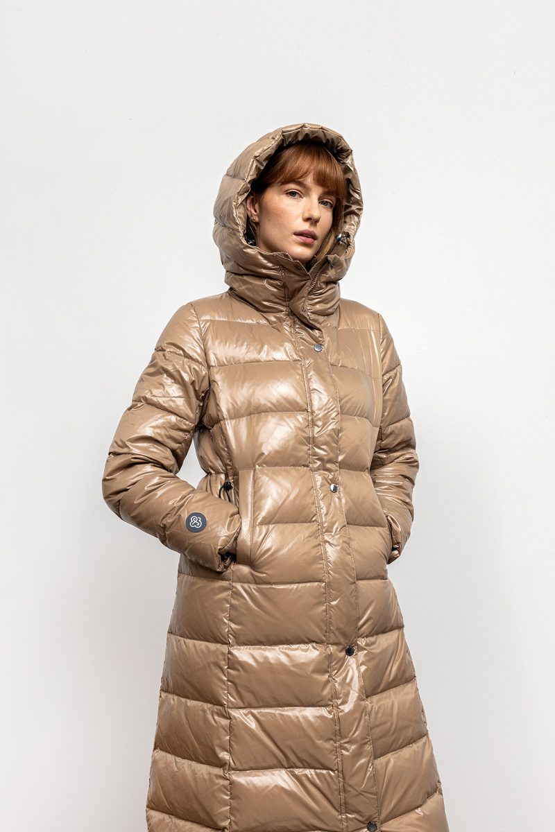 Long coat for winter, natural down insulation. A-line cut. Adjustable waist.