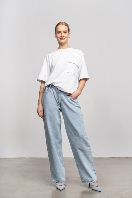 Denim trousers mid-rise with loose leg; front and back pockets, light washed denim.