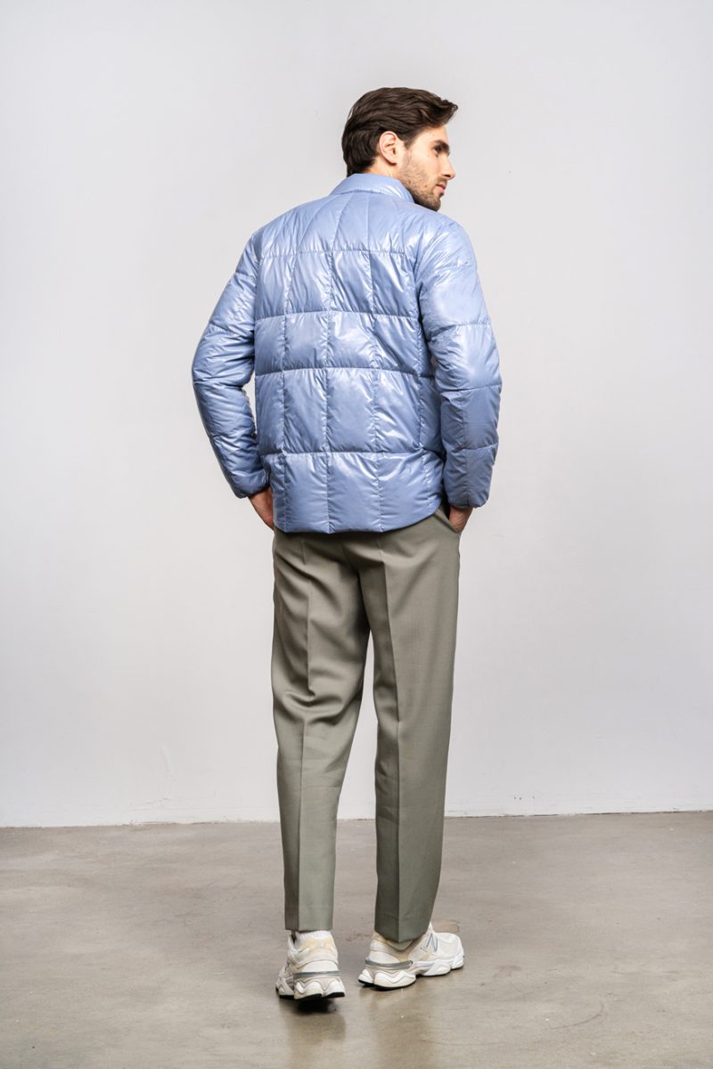 Man light jacket for spring and fall, wirth natural down filling. Zipper and front pockets. Compact jacket.