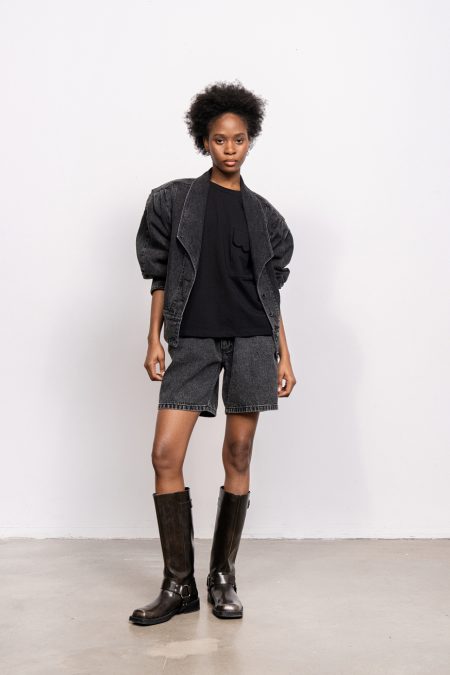 Denim shorts mid-rise with loose leg; front and back pockets, blacked washed denim. Denim jacket with wide shoulder, soft black denim and buttons on the front.
