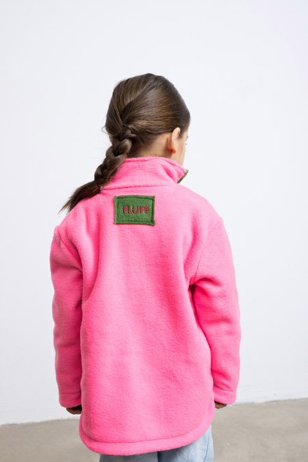 Reversible fleece jacket for kids with two pockets and front pockets, contrasting colours - burgundy and neon pink. Long sleeve, snap fastening.