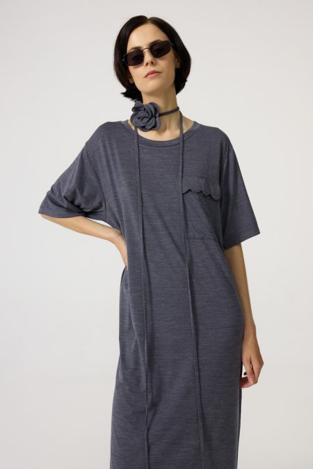 Long merino&lyocell dress, grey colour with flower string as choker and front pocket. Loose fit.