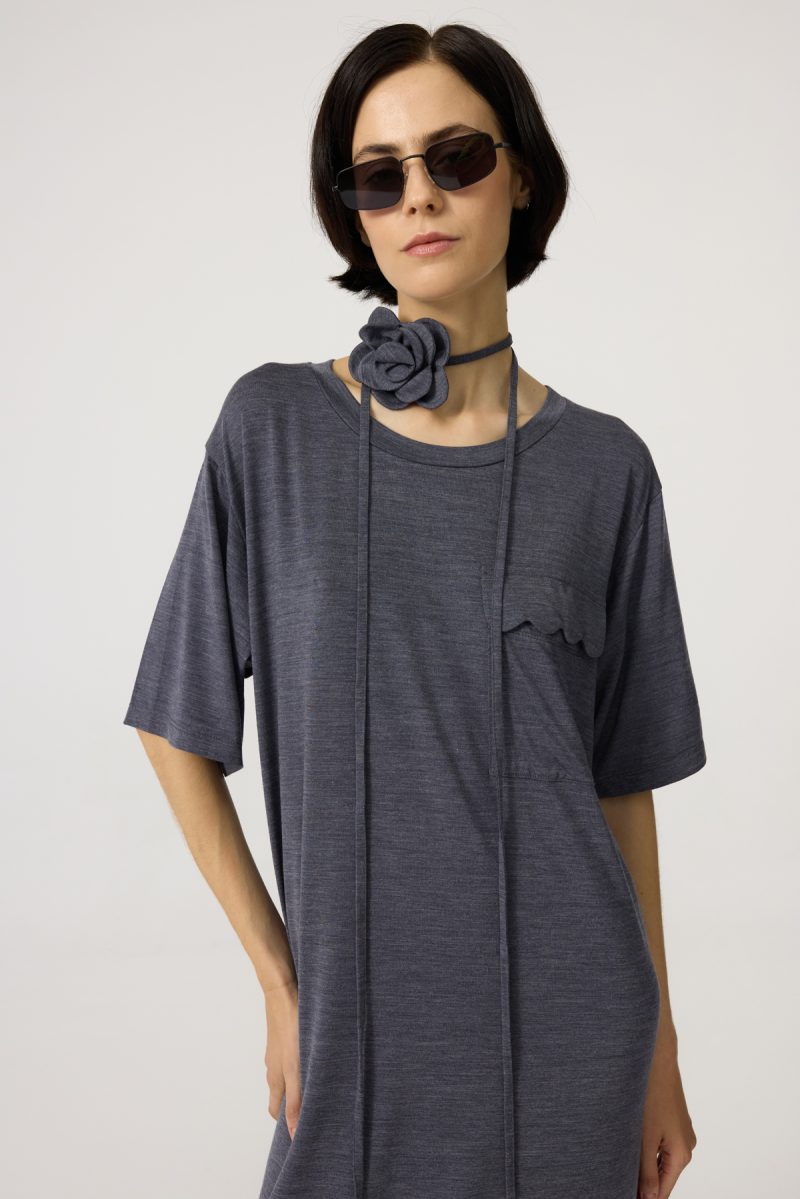 Long merino&lyocell dress, grey colour with flower string as choker and front pocket. Loose fit.