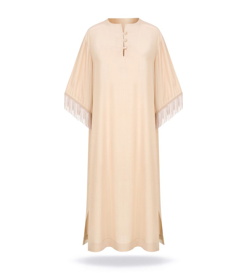 Long dress with fringe on the sleeves, warm beige tone, side slit.